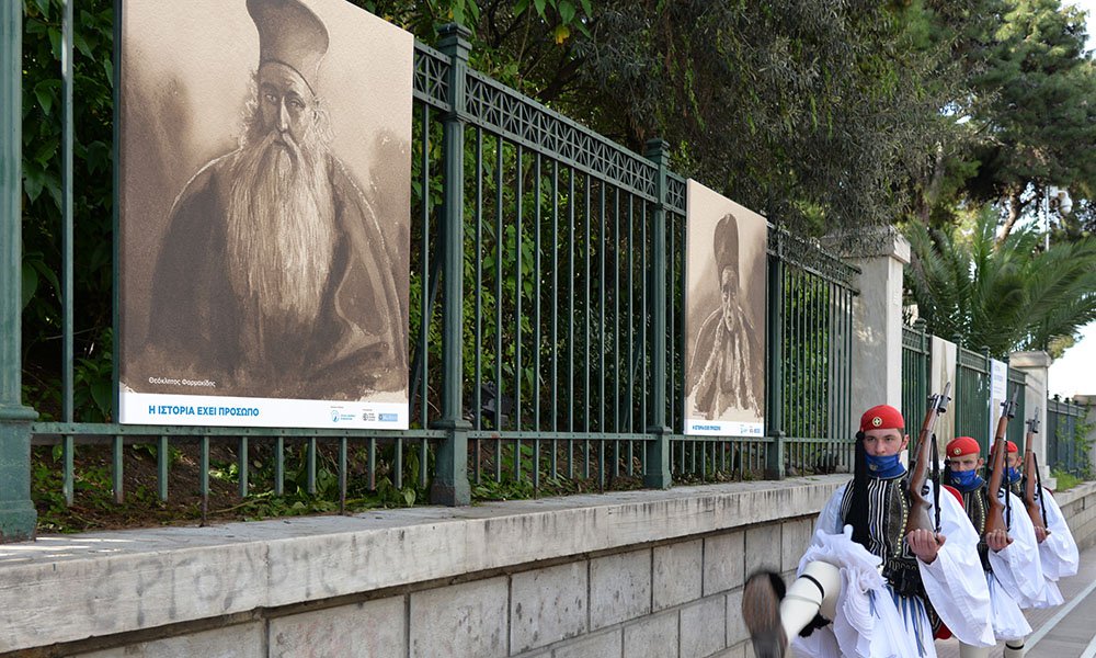 View of the outdoor exhibition. The portraits depict Theoklitos Pharmakidis (left) and Panoutsos Notaras (right)