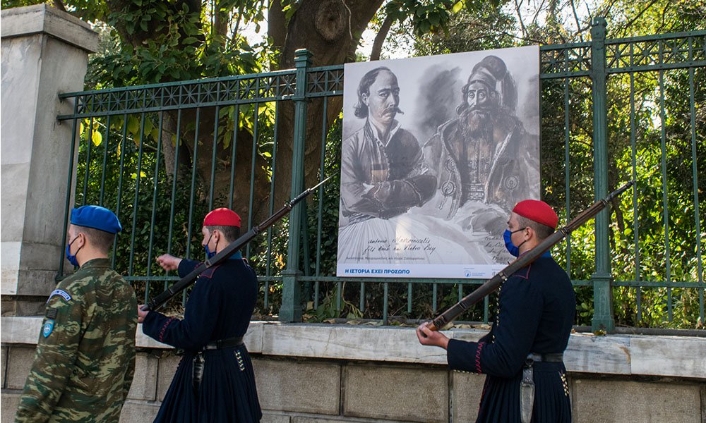 View of the outdoor exhibition. The portraits depict Anastasios Mavromichalis and Ilias Salafatinos