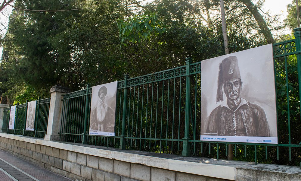 View of the outdoor exhibition. The portraits (right to left) depict Theodoros Kolokotronis, Constantinos Oikonomos ex Oikonomon, Spyridon G. Karaiskakis.